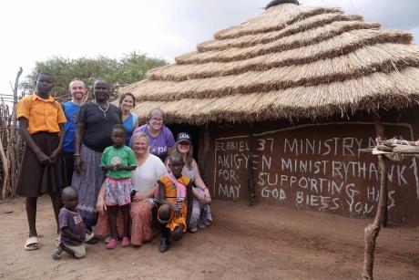 Rebecca and her team visit a home of one of their student 