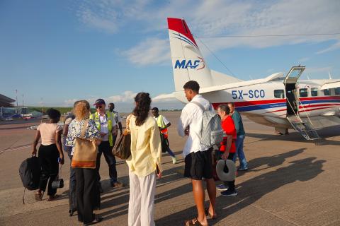 Pilot Wim briefing passengers at Entebbe International Airport